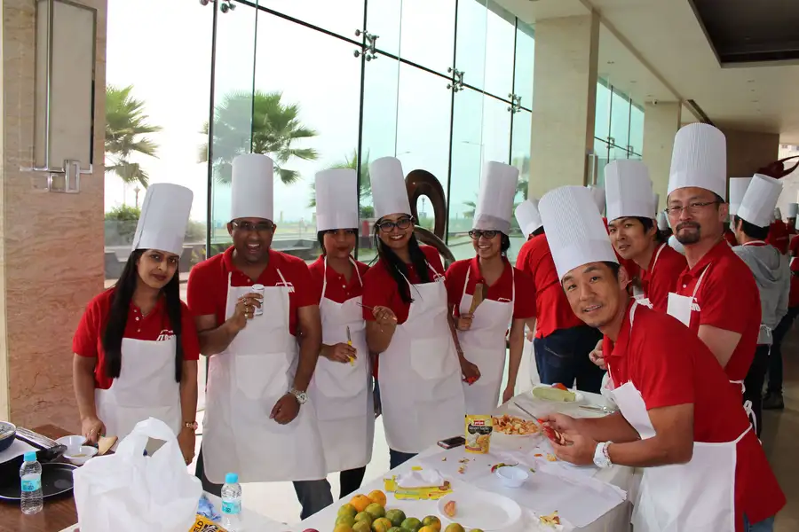 Teams collaborating in a Cooking team building at The Thought Bulb